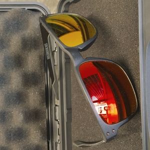 Like NEW OAKLEY, Team USA, Polorized lense, Grey, HOLBROOK MIX; $215.00 in store